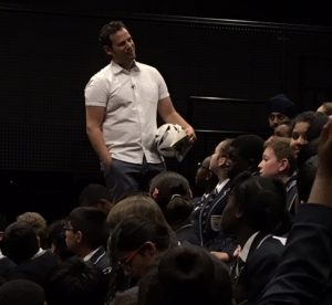 Dan speaking in a visit to a school.